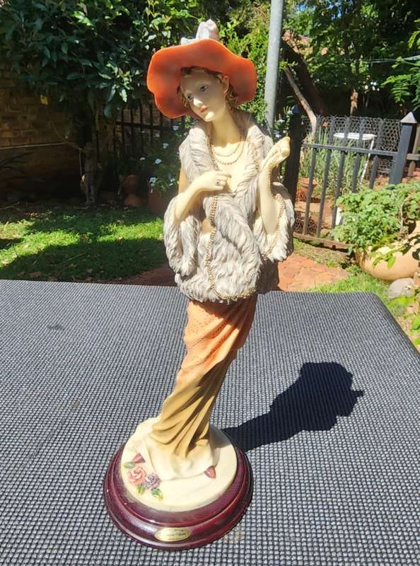 ELEGANT LADY JULIANA COLLECTION 2004 FIGURINE WITH FUR COAT, HAT AND LONG NECKLACE HAND FINISHED