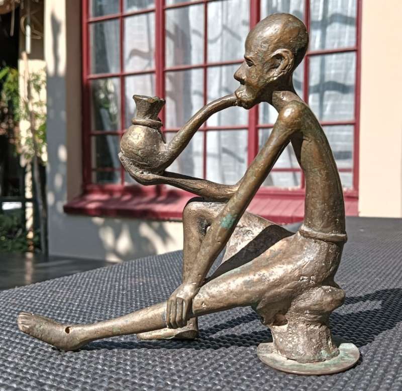 African Bronze Sculpture Man Smoking Pipe West African Green Patina Visible