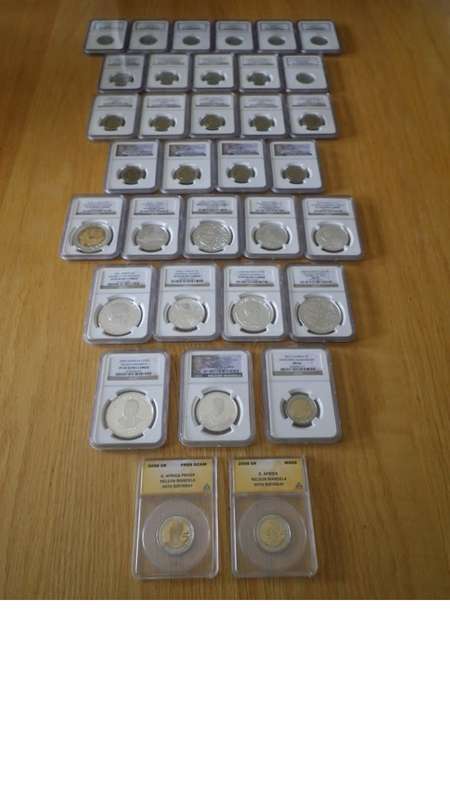 Nelson Mandela and Inauguration proof coins.
