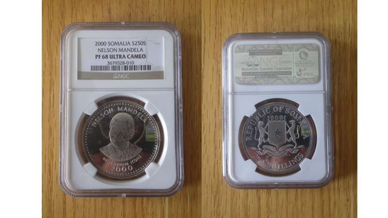 Nelson Mandela and Inauguration proof coins.