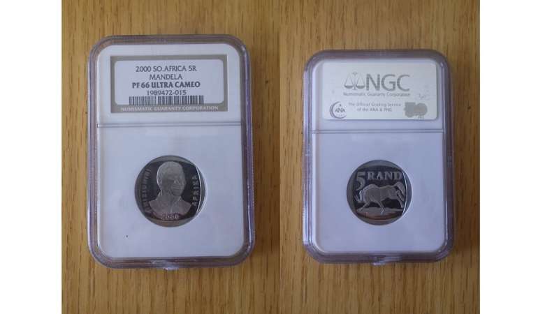 Nelson Mandela and Inauguration proof coins.