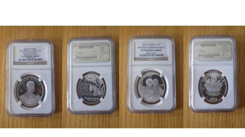 Nelson Mandela and Inauguration proof coins.
