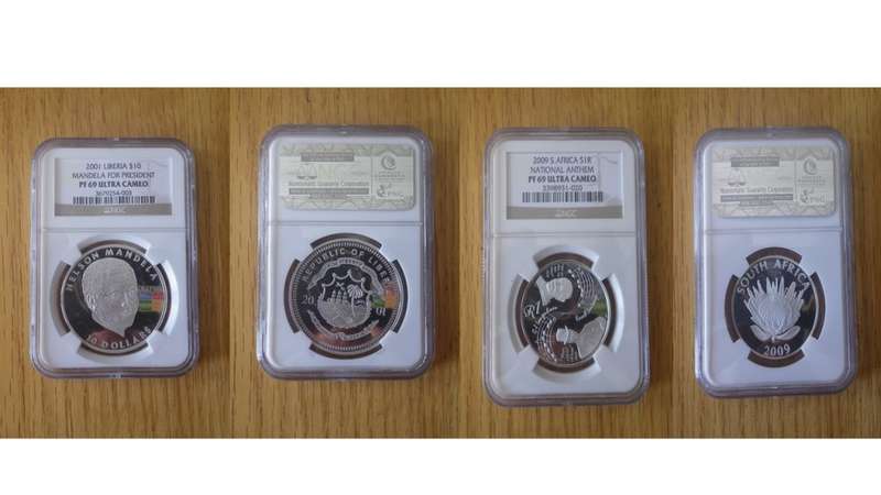 Nelson Mandela and Inauguration proof coins.