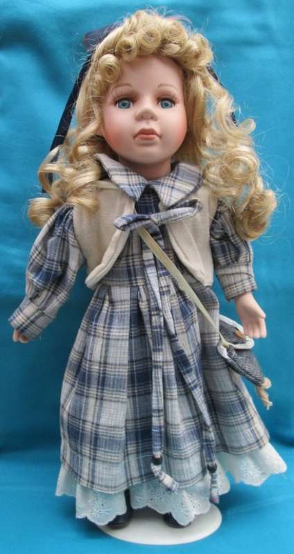 PORCELAIN DISPLAY DOLL WITH STAND