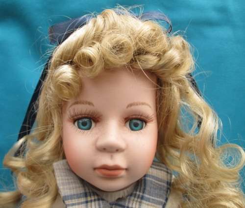 PORCELAIN DISPLAY DOLL WITH STAND