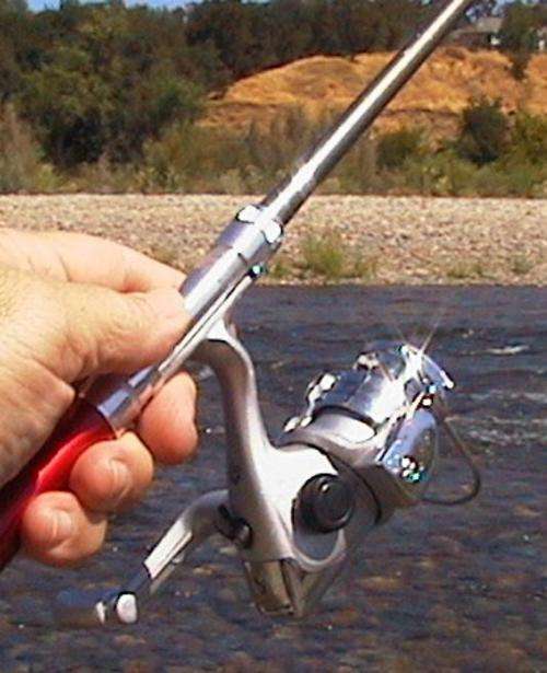 Fishing Rod Pen Golden with large reel