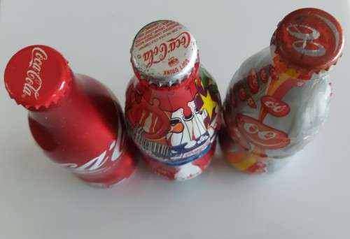 3x Collectable Coca Cola Bottles. Sealed - See pictures
