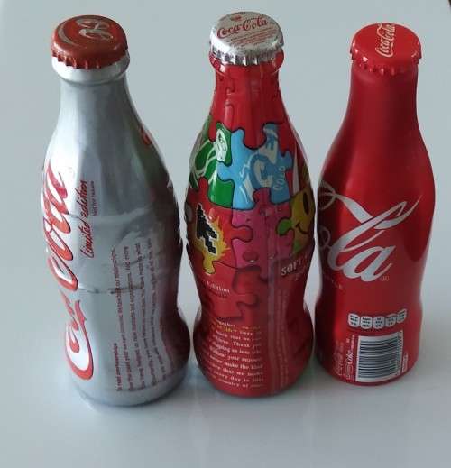 3x Collectable Coca Cola Bottles. Sealed - See pictures