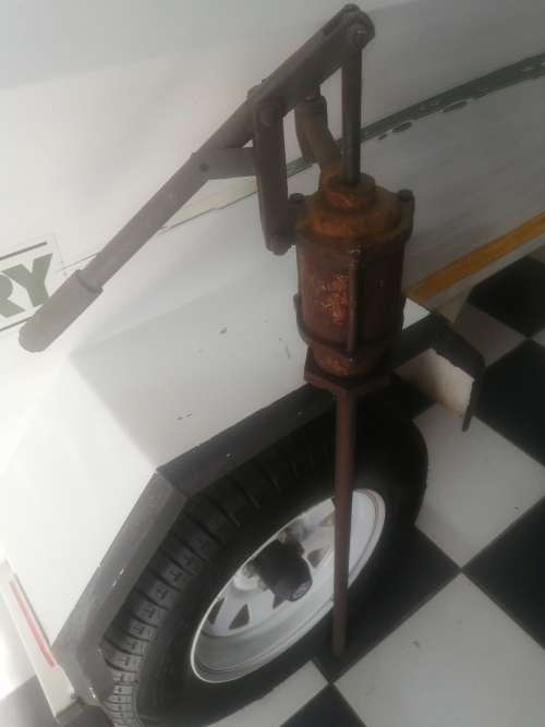 Very old diesel pump with a lot of patina