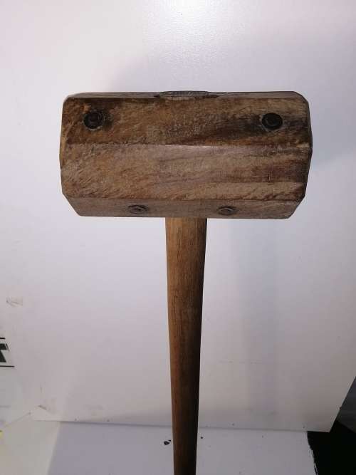 Big wooden hammer with lots of patina