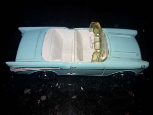 Box of assorted die cast cars and planes