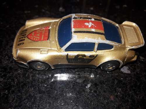 Box of assorted die cast cars and planes