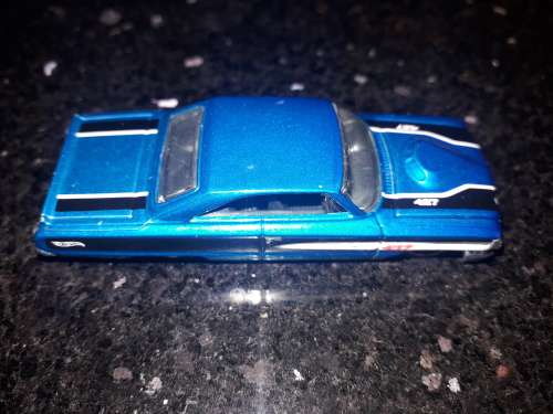 Box of assorted die cast cars and planes