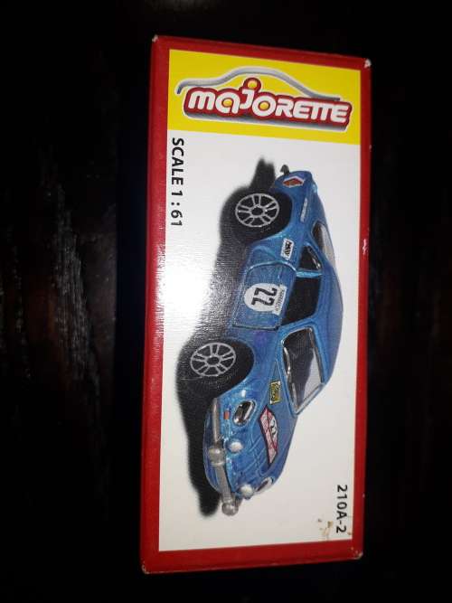 Greenlight Model car and 4 others plus one tin toy