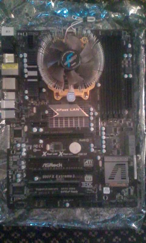 ASRock 990FX Extreme3 + AMD Phenom II X6 1075T