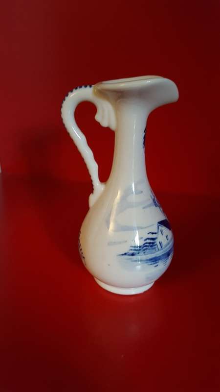 Lucia ware, Bud vase. Hand Painted in Delft Blue. Signed by the Artist.