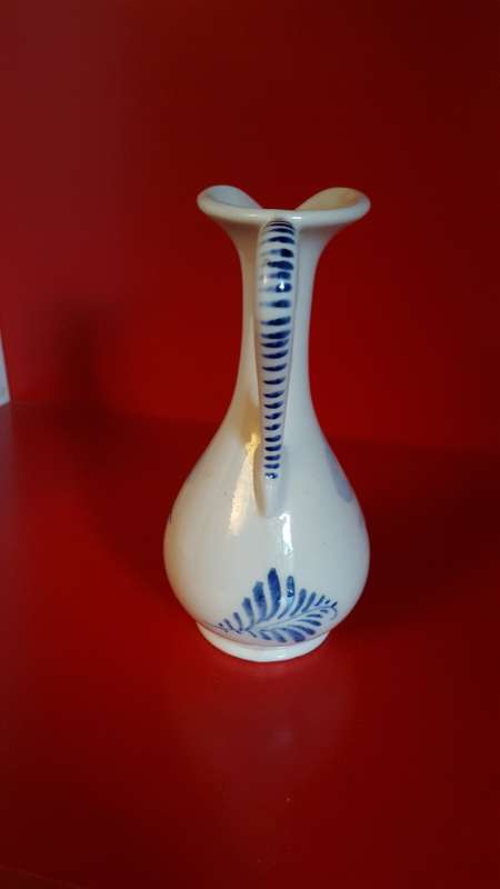 Lucia ware, Bud vase. Hand Painted in Delft Blue. Signed by the Artist.