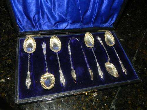 HALLMARKED SILVER APOSTLE TEASPOONS AND SUGAR NIPS, GILDED BOWLS, BIRMINGHAM 1904