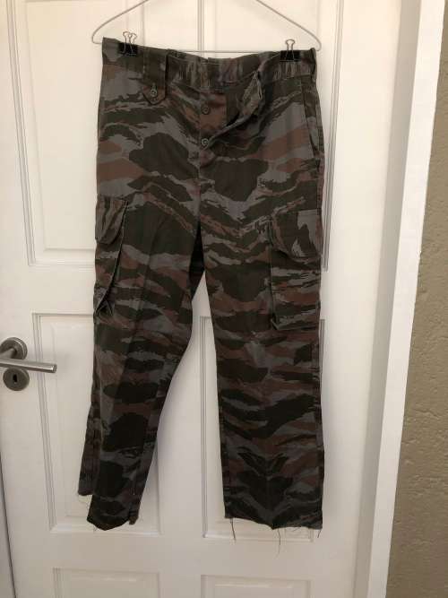 FAPLA uniform, consisting of trousers, shirt and cap.