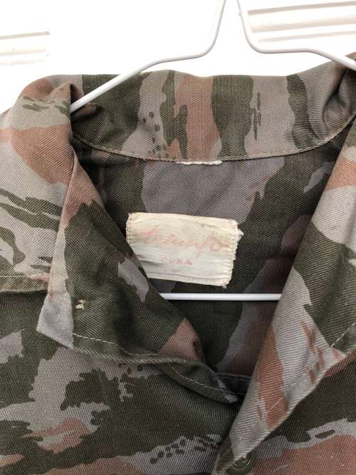 FAPLA uniform, consisting of trousers, shirt and cap.
