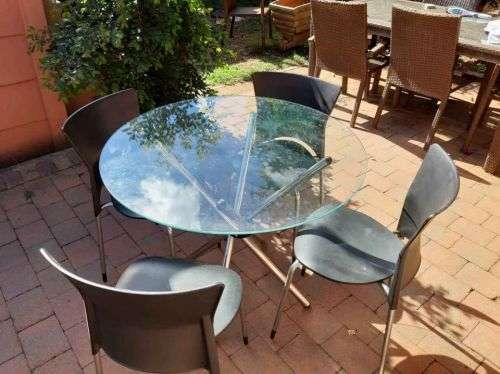 Glass table and 4 chairs