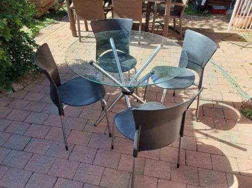 Glass table and 4 chairs