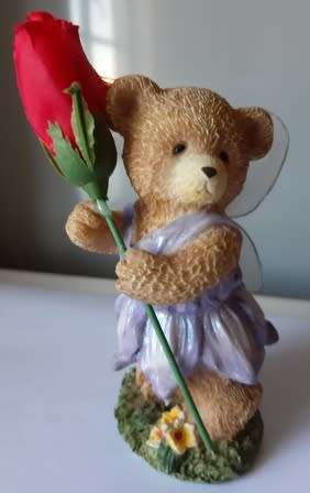 Girl bear with a rose figure