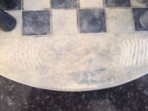 Soap stone chess set and board.