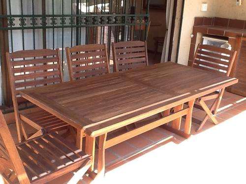 Patio table - 8 chairs - 8 green cushions