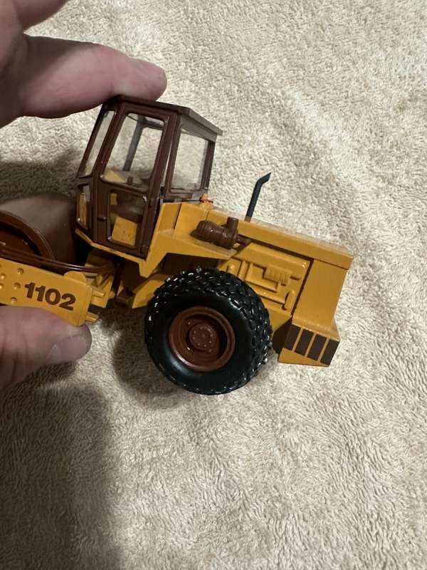 DIECAST CASE COMPACTOR ROLLER