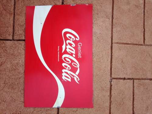 Coca Cola geniet metal painted sign