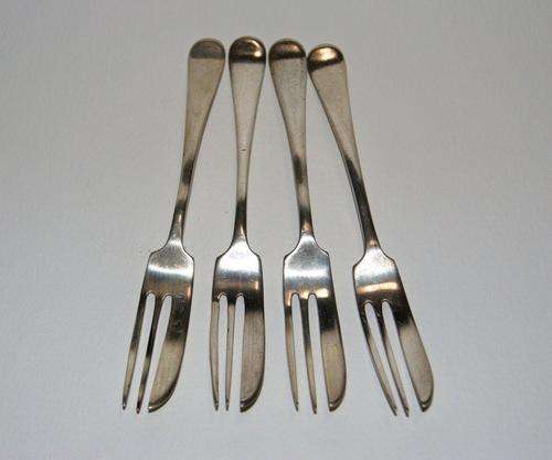FOUR HALLMARKED SILVER CAKE FORKS
