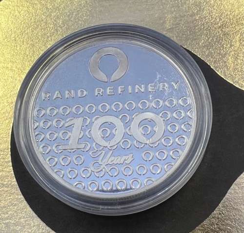 RAND REFINERY ONE OUNCE SILVER `ROUND` - 100 YEARS OF RAND REF