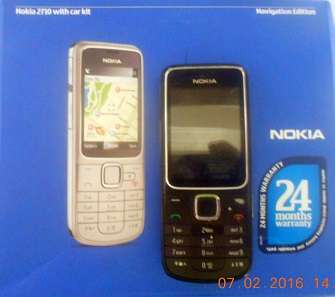 Nokia 2710  ( WATER DAMAGED ) + extras