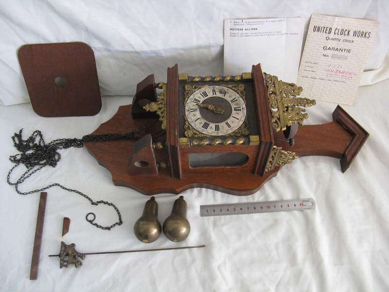 VINTAGE HOLLAND PENDULLAM WALL CLOCK. MULTIPLE FAULTS AS PICTURED. UNTESTED. SOLD "AS IS".