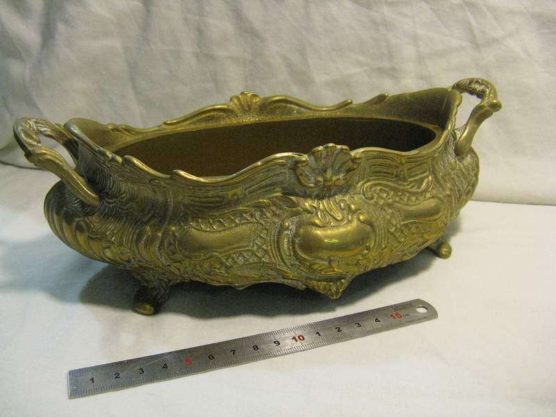 BRASS PLANTER WITH PLASTIC INNER.