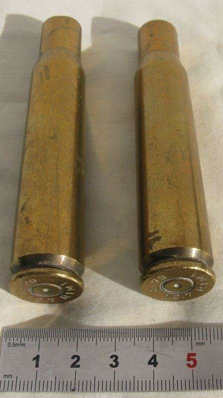 R1M1 12.7 A79 EMPTY BRASS BULLET SHELLS. BID FOR THE TWO.