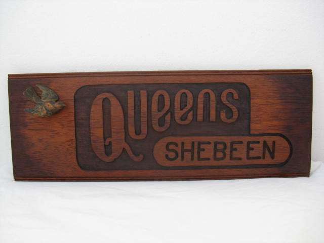 QUEENS SHEBEEN SOLID WOOD PLAQUE. L65cm x W23.5cm . P&P=R45.