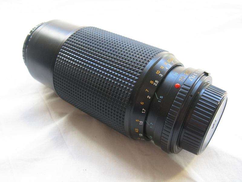 MINOLTA MD ZOOM 70-210mm 1:4 JAPAN. INCLUDES FILTER: MC-1, 55mm, JAPAN.