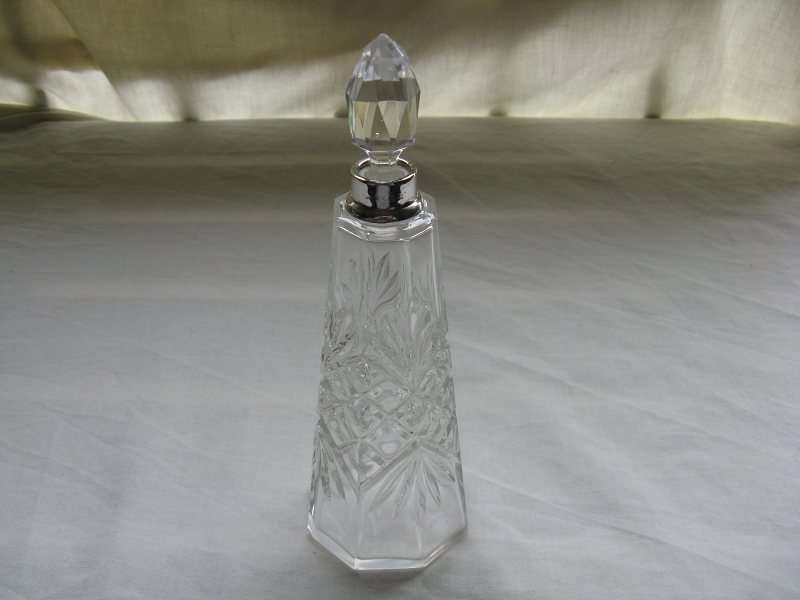 VINTAGE GLASS PERFUME BOTTLE WITH A HALLMARKED SILVER TOP RING. H 18.5cm.