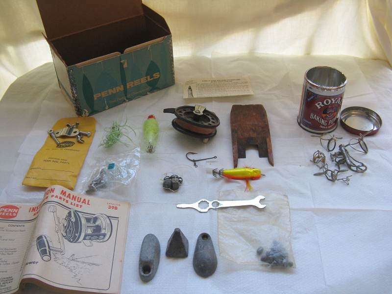 PENN REEL PARTS COMBO. BOX: L 19cm x W 10.7cm x H 10.8cm.