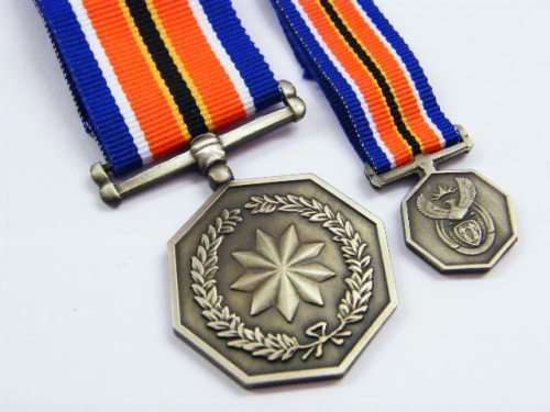 Tshumelo Ikatelaho medal number 2222 plus miniature - nice number - as per photo