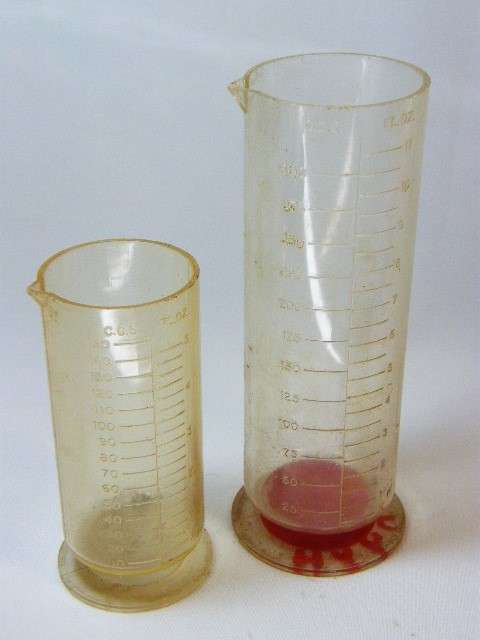 Lot of 2 Paterson measuring cylinders - as per photo