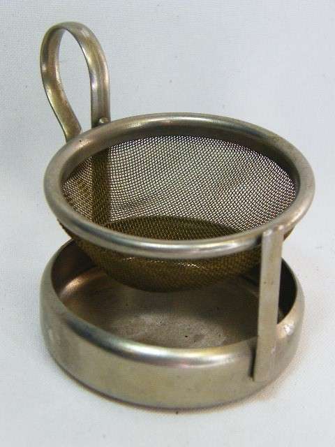 Vintage tea strainer stand - as per photo