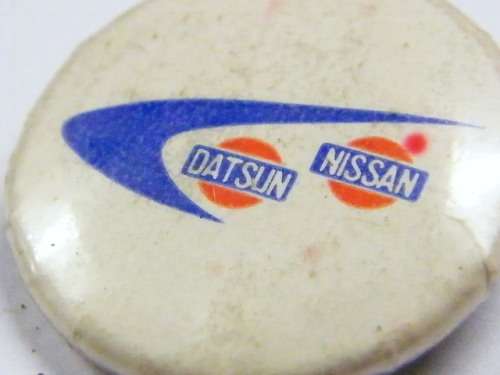 Vintage Datsun Nissan lapel pin badge