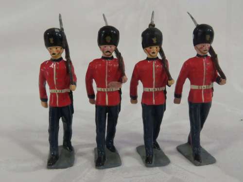 Set of 4  British lead soldiers - Guards marching with rifles