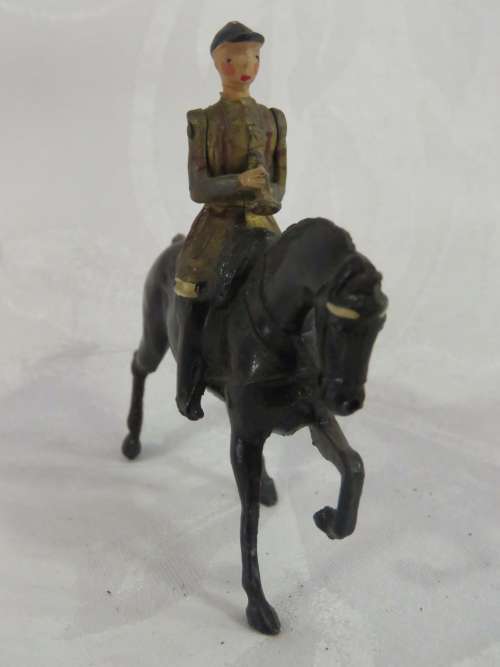 Vintage Cornet player lead soldier on horse - Lifeguards of Household cavalry mounted band