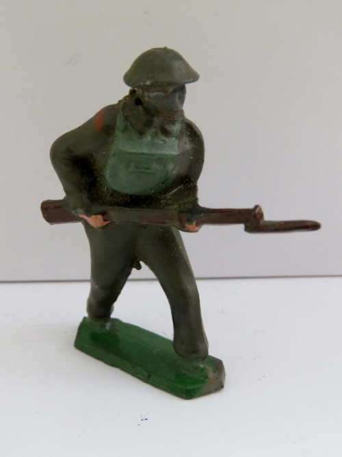 WW2 British lead soldier running with rifle