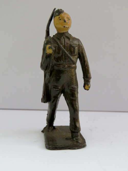 British lead soldier walking with rifle