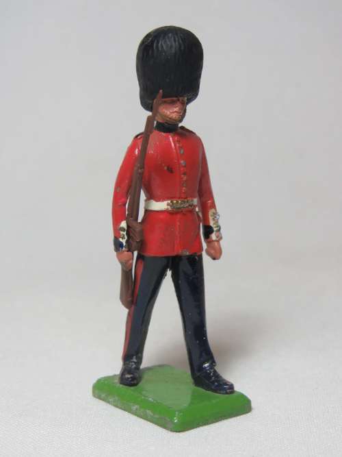 Vintage Britains Ltd British guard lead soldier with rubber hat and plastic gun